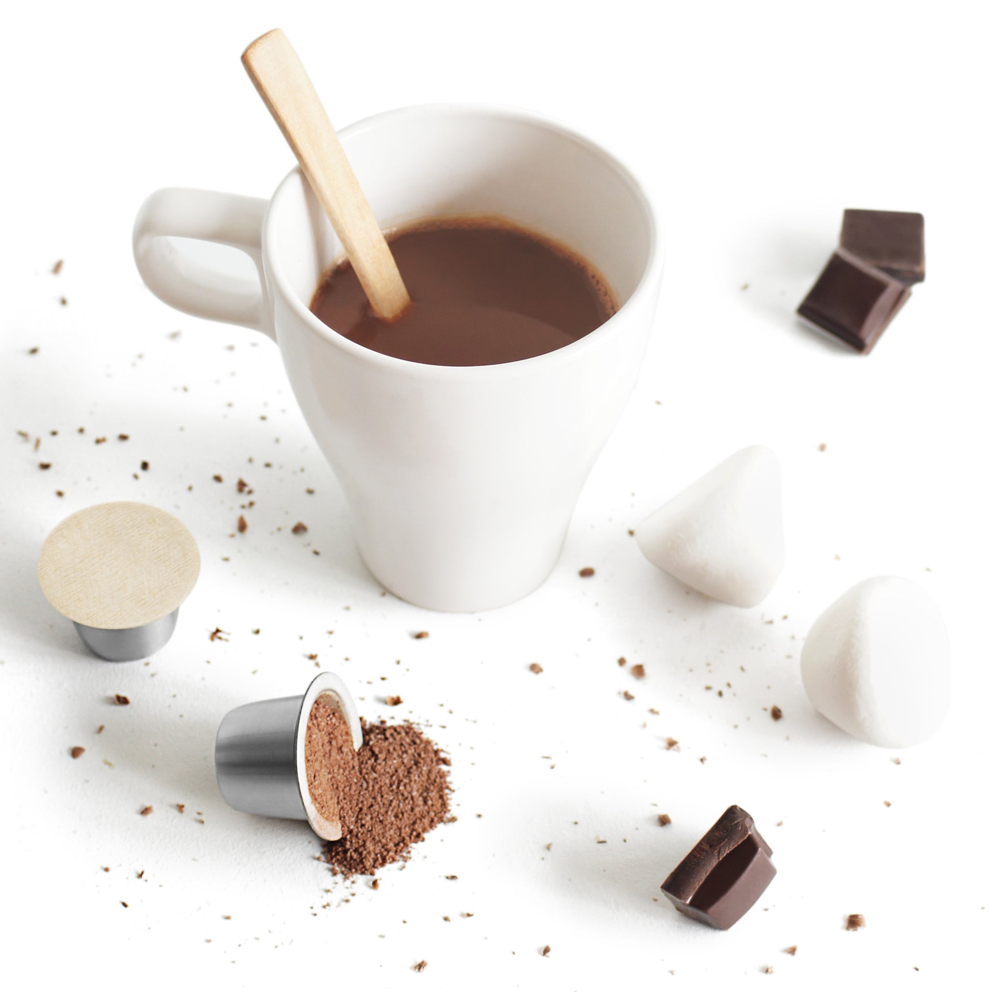 Make hot chocolate in a Nespresso Machine with these Sealpod Biodegradable Paper Lids and reusable coffee capsules